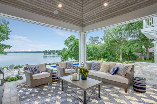 Outdoor covered patio perfect for entertaining by the lake